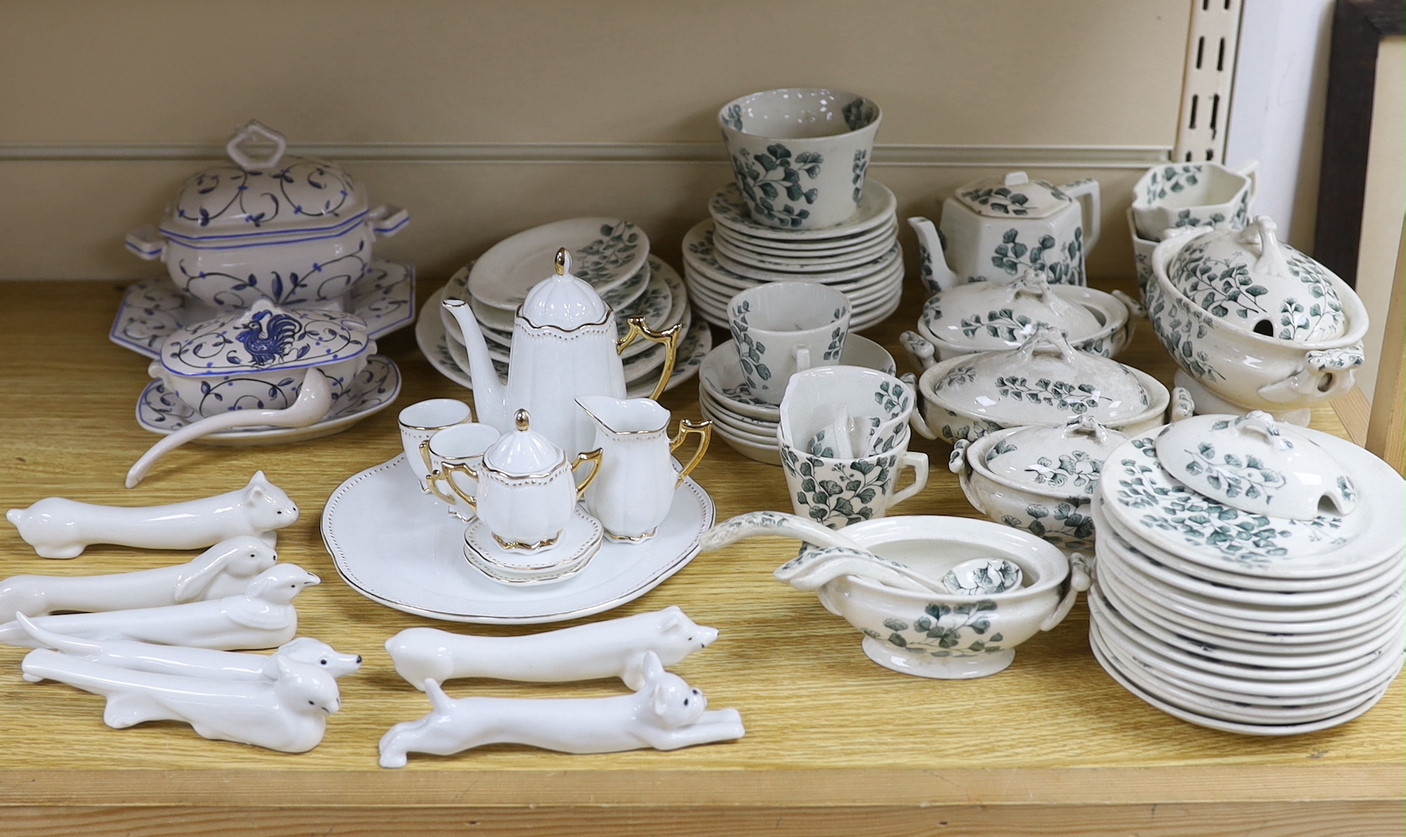 A Ridgways ‘Maiden Hair Fern’ children’s dinner set, together with other miniature tea ware and animalistic knife rests
